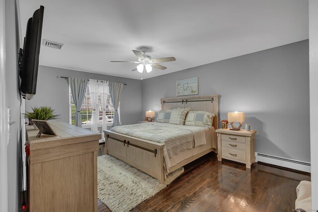 37 Lakeview Ave, Shelton, CT 06484 - bedroom featuring baseboard heating, wood finished floors, a ceiling fan, and baseboards