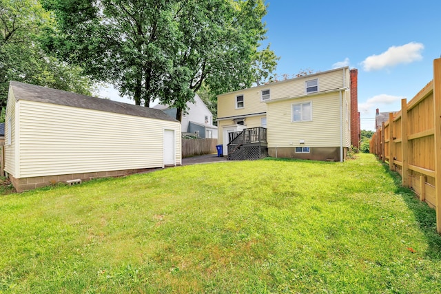 84 Oxford St, Bridgeport, CT 06606 - back of house with a fenced backyard and an outdoor structure