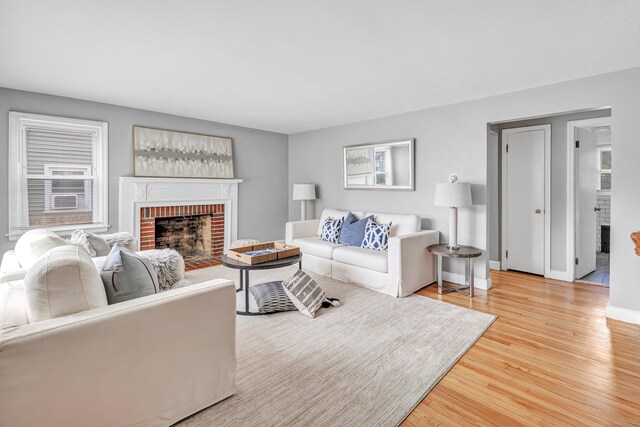84 Oxford St, Bridgeport, CT 06606 - living room with a fireplace and wood finished floors