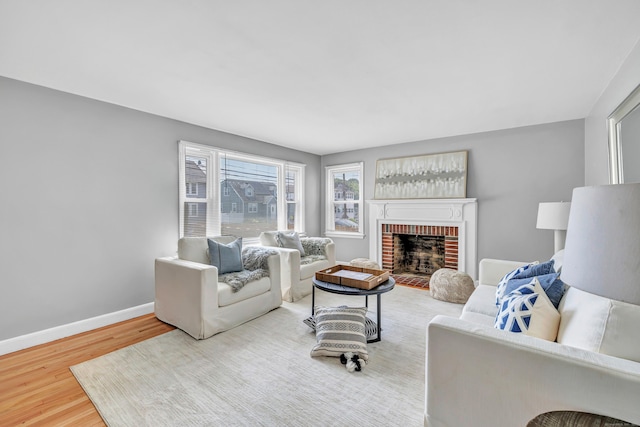 84 Oxford St, Bridgeport, CT 06606 - living area with wood finished floors and a fireplace
