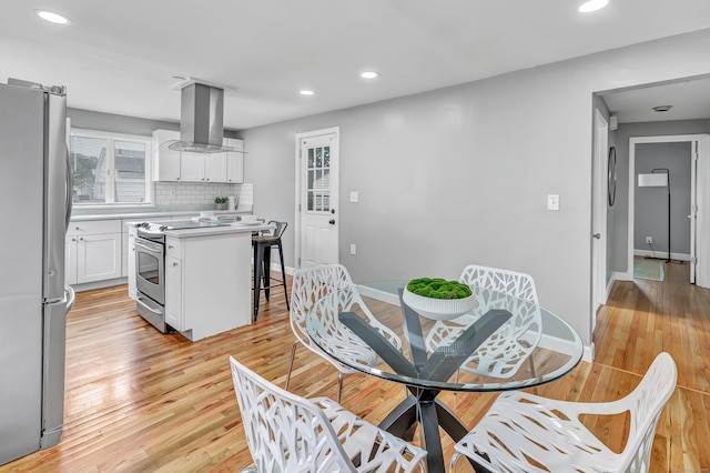 84 Oxford St, Bridgeport, CT 06606 - dining space featuring light wood-style flooring and recessed lighting