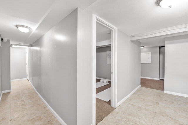 84 Oxford St, Bridgeport, CT 06606 - hallway featuring baseboards and tile patterned flooring