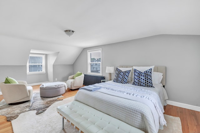 84 Oxford St, Bridgeport, CT 06606 - bedroom with lofted ceiling and wood finished floors