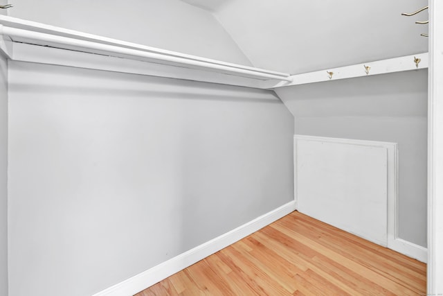 84 Oxford St, Bridgeport, CT 06606 - walk in closet featuring vaulted ceiling and wood finished floors