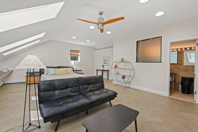 bedroom featuring recessed lighting, baseboards, and vaulted ceiling with skylight