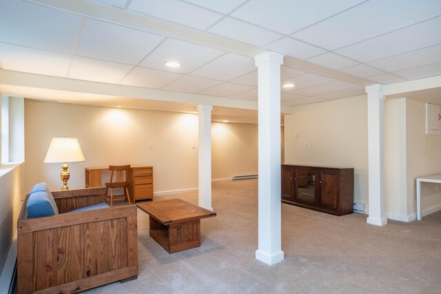 carpeted living area with baseboard heating, baseboards, recessed lighting, and a paneled ceiling