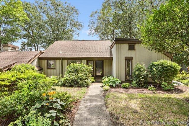 mid-century modern home featuring board and batten siding
