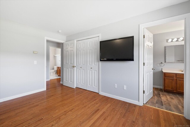6 Margaret Cir, Pomfret, CT 06259 - unfurnished bedroom featuring light wood-type flooring, baseboards, and a closet