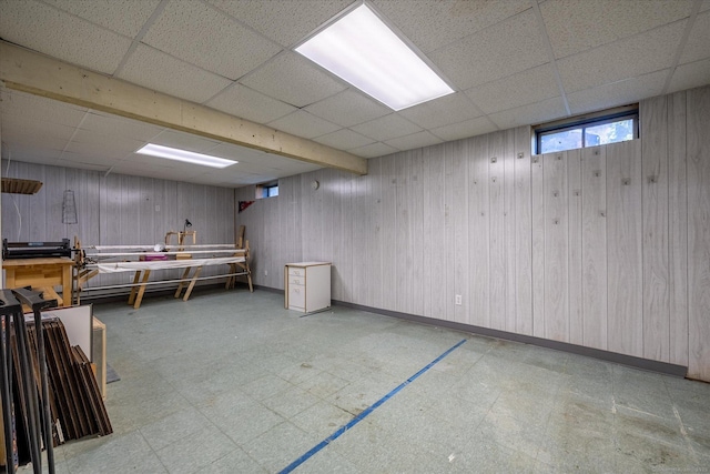 6 Margaret Cir, Pomfret, CT 06259 - below grade area with tile patterned floors, baseboards, wood walls, and a paneled ceiling