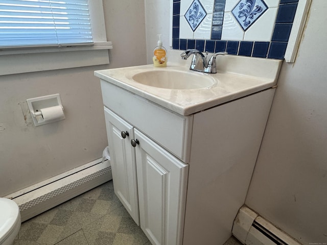 33 E Brown St, West Haven, CT 06516 - bathroom with vanity, a baseboard radiator, and toilet