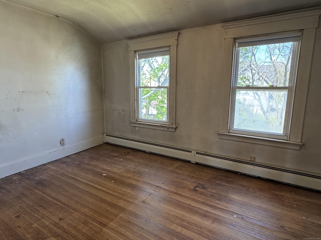 33 E Brown St, West Haven, CT 06516 - spare room with wood-type flooring, a baseboard heating unit, lofted ceiling, and a wealth of natural light