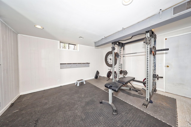 exercise room with visible vents and recessed lighting