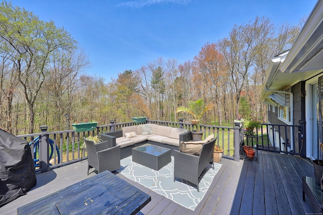 deck with outdoor lounge area