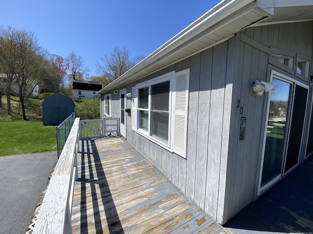 20 Connecticut Dr, Plainfield, CT 06374 - wooden deck featuring a storage shed and an outbuilding