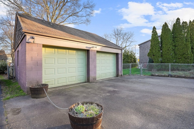 detached garage with fence