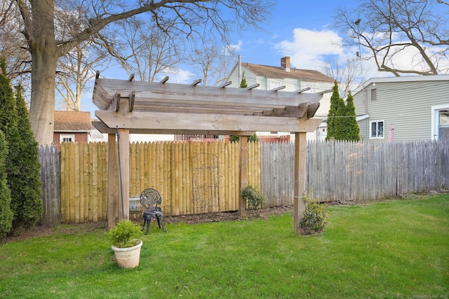 view of yard with fence and a pergola