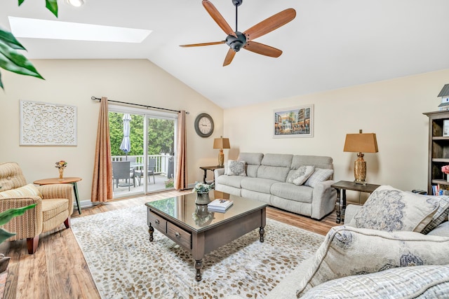 356 Green Rock Rock Unit 356, Shelton, CT 06484 - living area featuring a ceiling fan, a skylight, wood finished floors, lofted ceiling, and baseboards