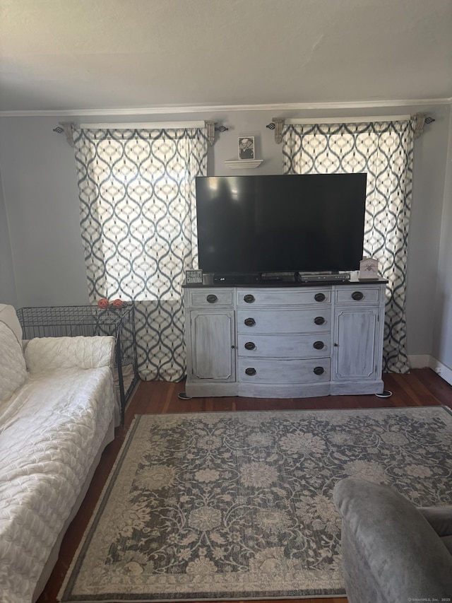 45 Ivy St, Branford, CT 06405 - living area featuring dark wood-type flooring, crown molding, and baseboards