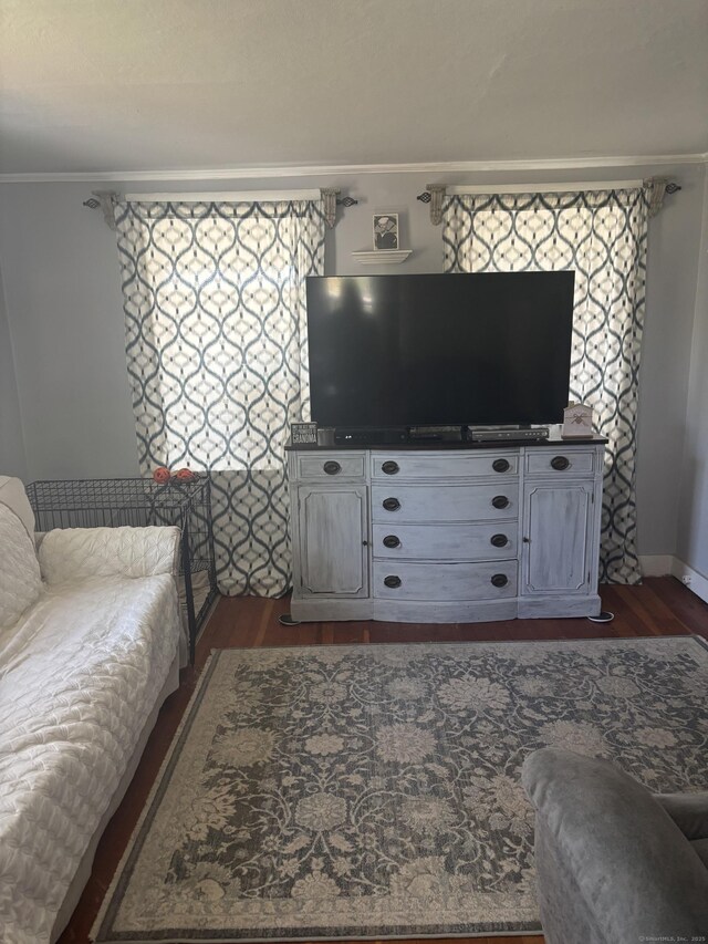 45 Ivy St, Branford, CT 06405 - living area featuring dark wood-type flooring, crown molding, and baseboards