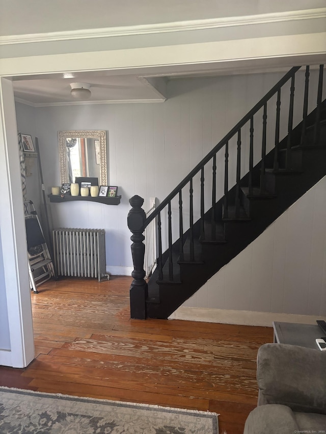 45 Ivy St, Branford, CT 06405 - stairway with radiator heating unit, wood-type flooring, and crown molding