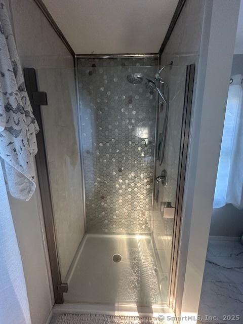 full bathroom with a stall shower