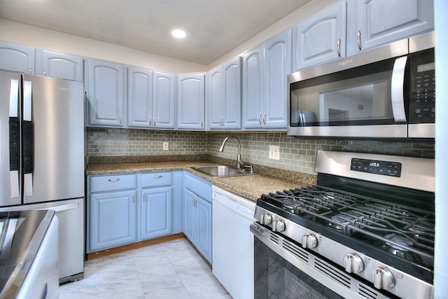 50 Greenhouse Rd Unit 17A, Bridgeport, CT 06606 - kitchen with stainless steel appliances, a sink, light marble finish flooring, decorative backsplash, and recessed lighting