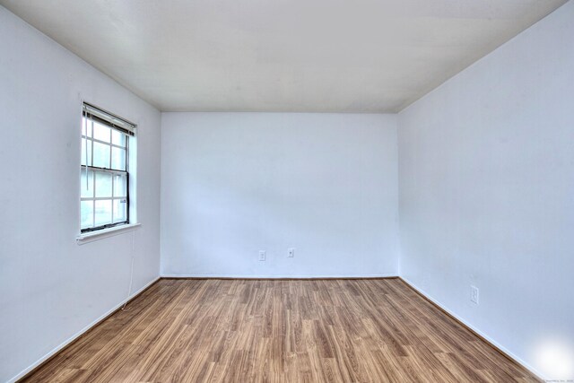 50 Greenhouse Rd Unit 17A, Bridgeport, CT 06606 - unfurnished room with wood finished floors and baseboards