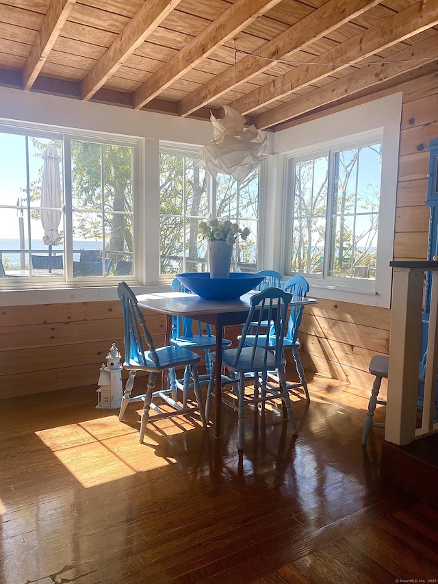 sunroom / solarium with beamed ceiling