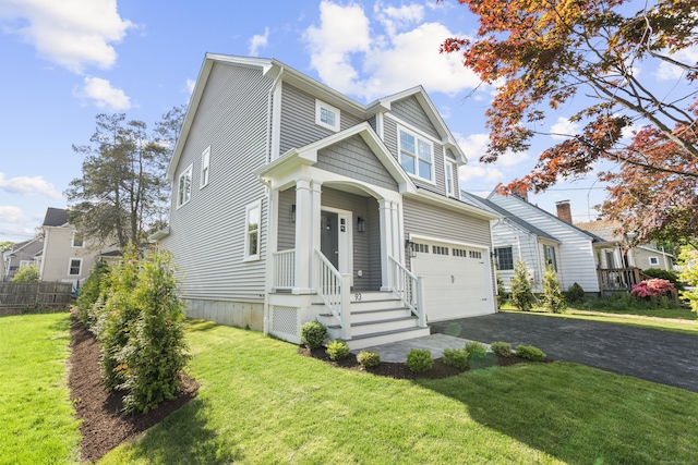 93 Wyoming St, Stratford, CT 06614 - view of front of home featuring driveway and a garage