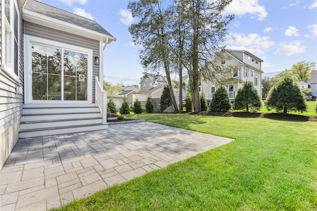 93 Wyoming St, Stratford, CT 06614 - view of green lawn featuring a patio area and a residential view