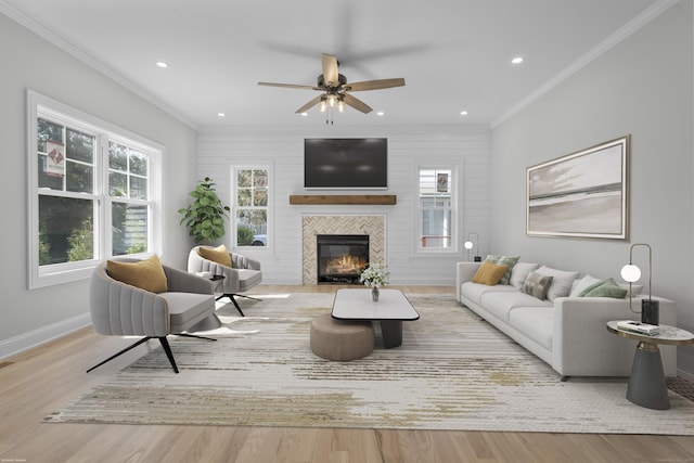 93 Wyoming St, Stratford, CT 06614 - living area featuring plenty of natural light, crown molding, wood finished floors, a ceiling fan, and recessed lighting