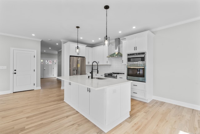 93 Wyoming St, Stratford, CT 06614 - kitchen with appliances with stainless steel finishes, wall chimney range hood, a sink, backsplash, and white cabinetry