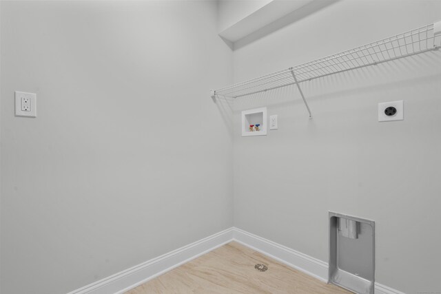 93 Wyoming St, Stratford, CT 06614 - clothes washing area with washer hookup, electric dryer hookup, baseboards, and light wood-style floors