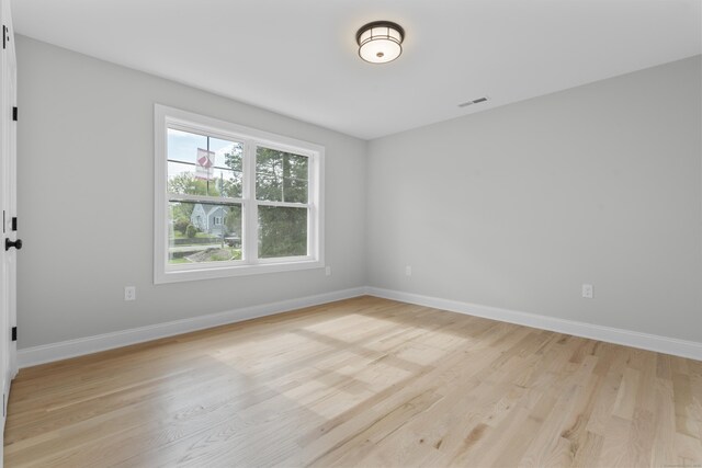 93 Wyoming St, Stratford, CT 06614 - spare room with light wood finished floors and baseboards
