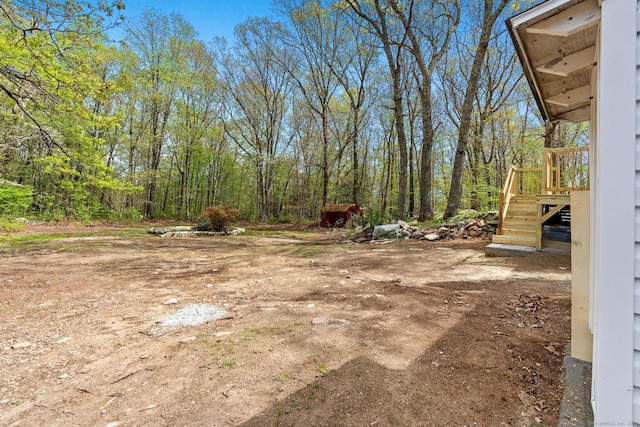 view of yard featuring stairs
