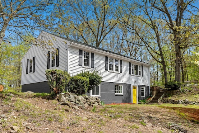 view of front of house with stairway