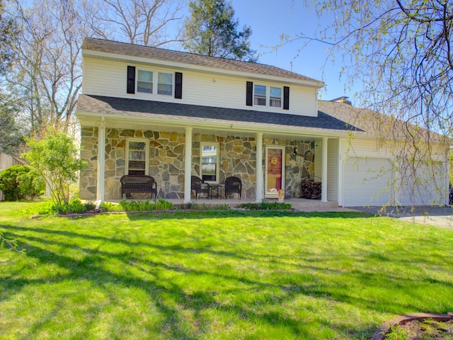 traditional-style home with a garage, a chimney, a front lawn, and stone siding