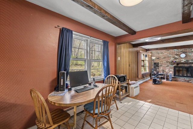 dining space with beamed ceiling, light colored carpet, plenty of natural light, and light tile patterned floors