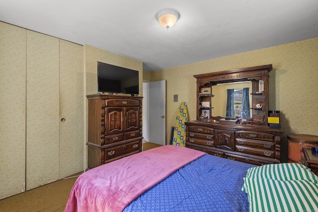 carpeted bedroom featuring wallpapered walls