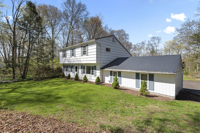 view of front of home with a front yard