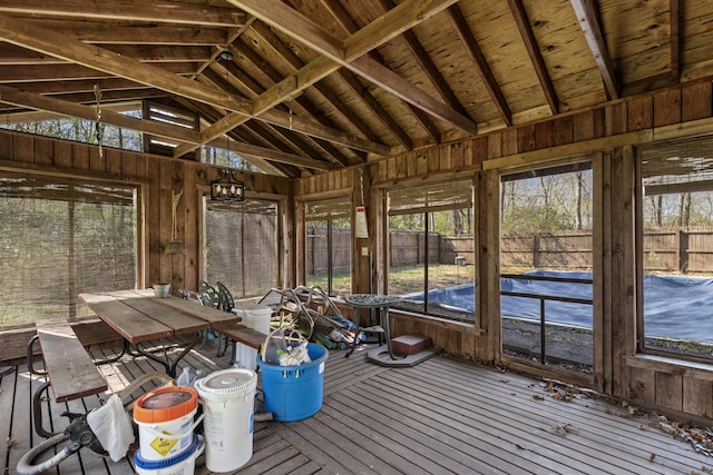unfurnished sunroom featuring a healthy amount of sunlight