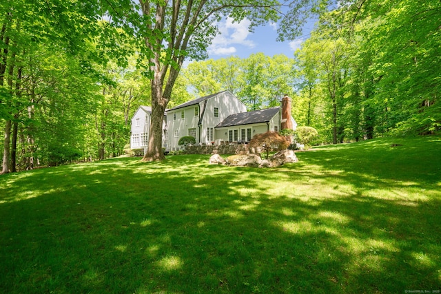 5 Dorr Rd, Darien, CT 06820 - rear view of property with a chimney and a yard