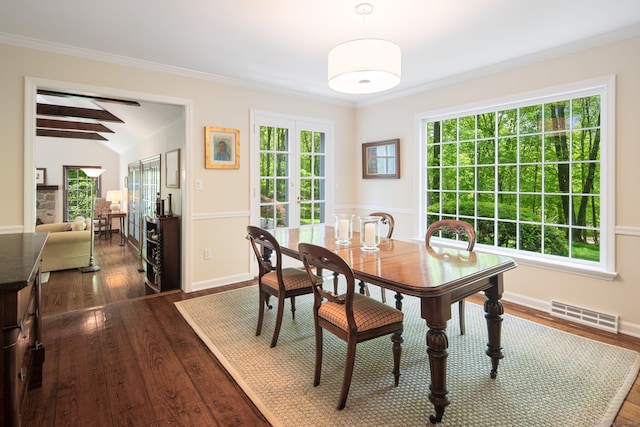 5 Dorr Rd, Darien, CT 06820 - dining space with dark wood-style floors, lofted ceiling, baseboards, and crown molding