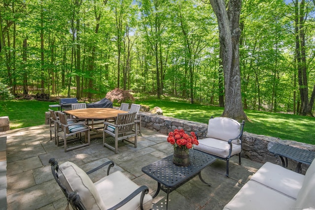 5 Dorr Rd, Darien, CT 06820 - view of patio / terrace featuring outdoor dining area and a forest view