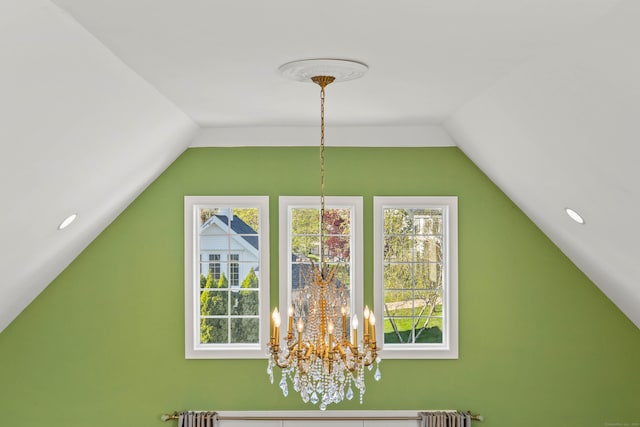 additional living space featuring radiator heating unit, vaulted ceiling, and an inviting chandelier