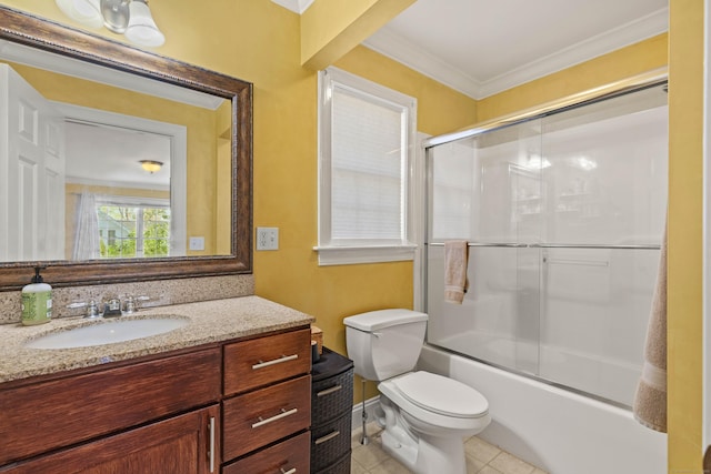 bathroom featuring tile patterned flooring, vanity, toilet, ornamental molding, and bath / shower combo with glass door