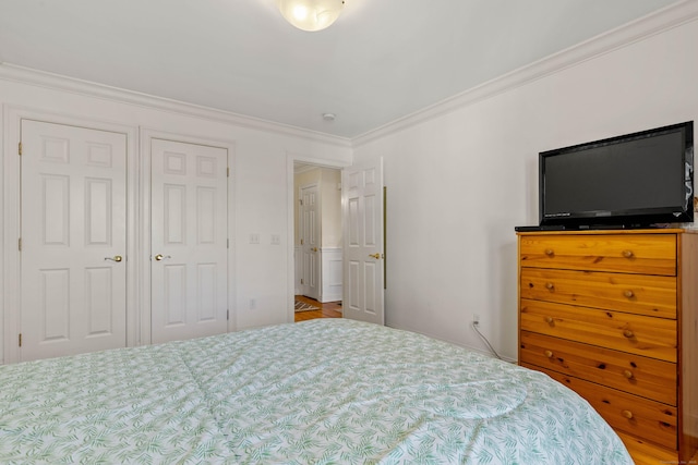 bedroom with crown molding