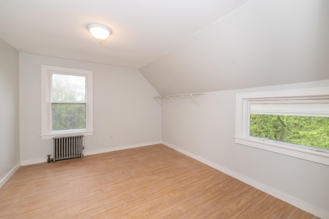 39 Tanner Ave, Norwich, CT 06360 - additional living space featuring radiator, light wood finished floors, vaulted ceiling, and baseboards