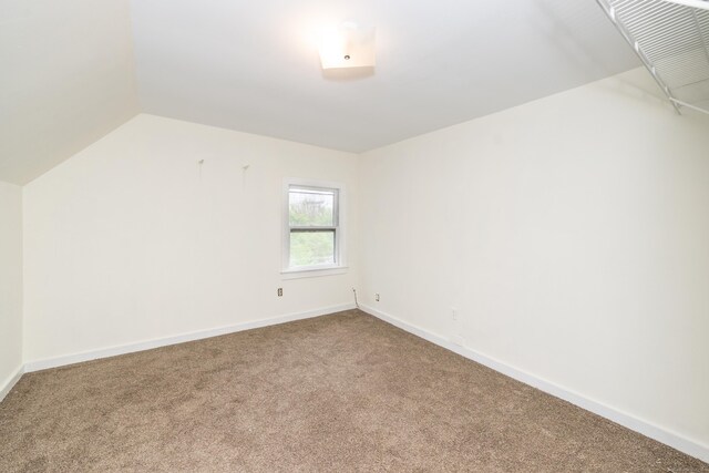 39 Tanner Ave, Norwich, CT 06360 - bonus room with carpet flooring, lofted ceiling, and baseboards