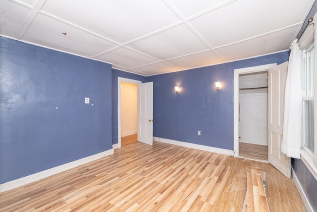 39 Tanner Ave, Norwich, CT 06360 - unfurnished bedroom featuring wood finished floors, baseboards, and a closet